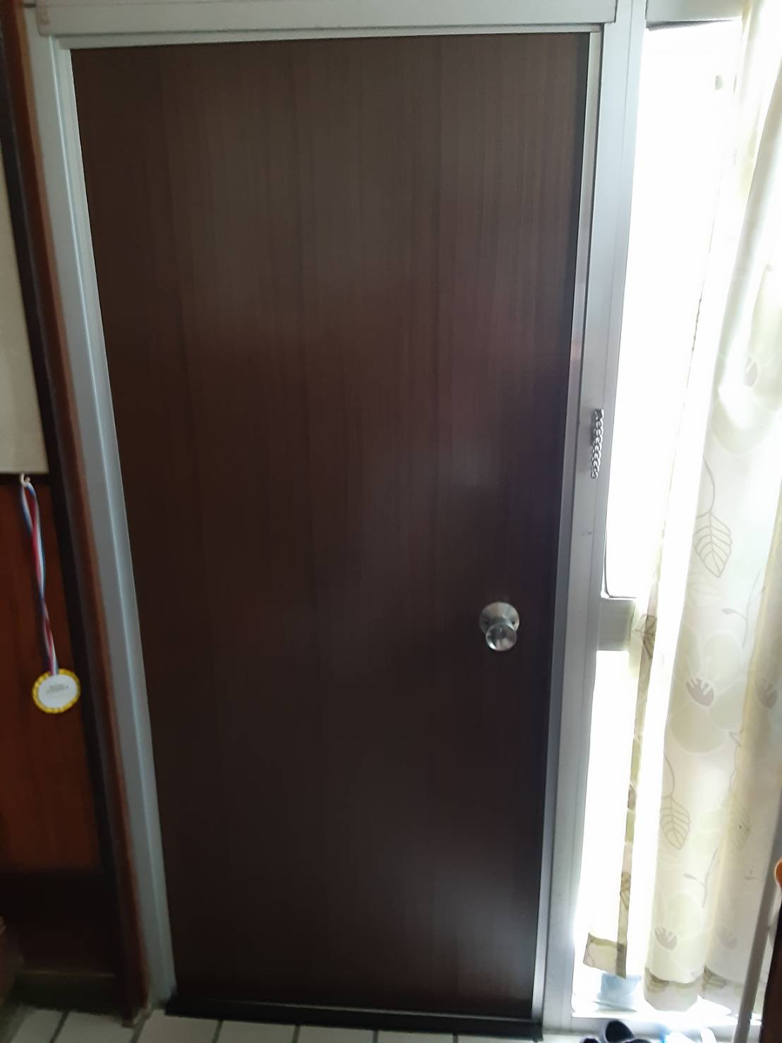 オカムラ・トーヨー住器の汎用ドア　ロンカラーフラッシュドア　交換の施工後の写真2